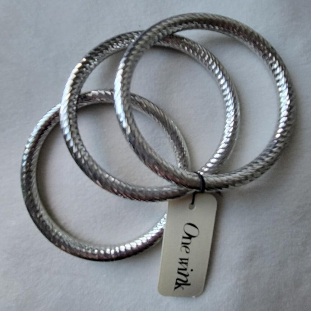 NWT One Wink Brand Set of Three Silver Toned Textured Bangle Bracelets